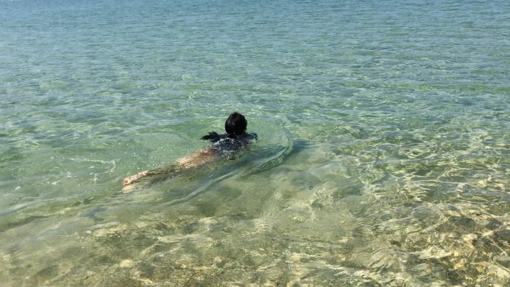 Swimming at Ao Prao beach at Samet island.